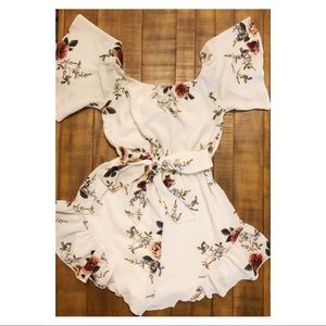 Reverse white floral romper